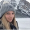 Faye smiling in a snowy landscape